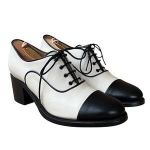THE OFFICE of Angela Scott “Mrs. Maisel” Black & Ivory Leather Oxford Heels